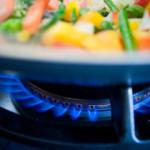 Food cooking on a gas hob