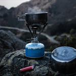 Food cooking on a camping stove